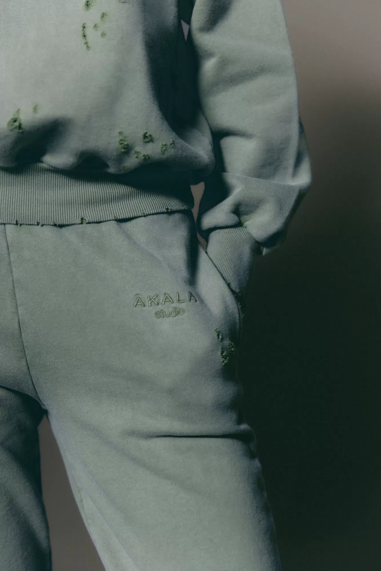 The Akala Studio Distressed Green Pants Best Sale