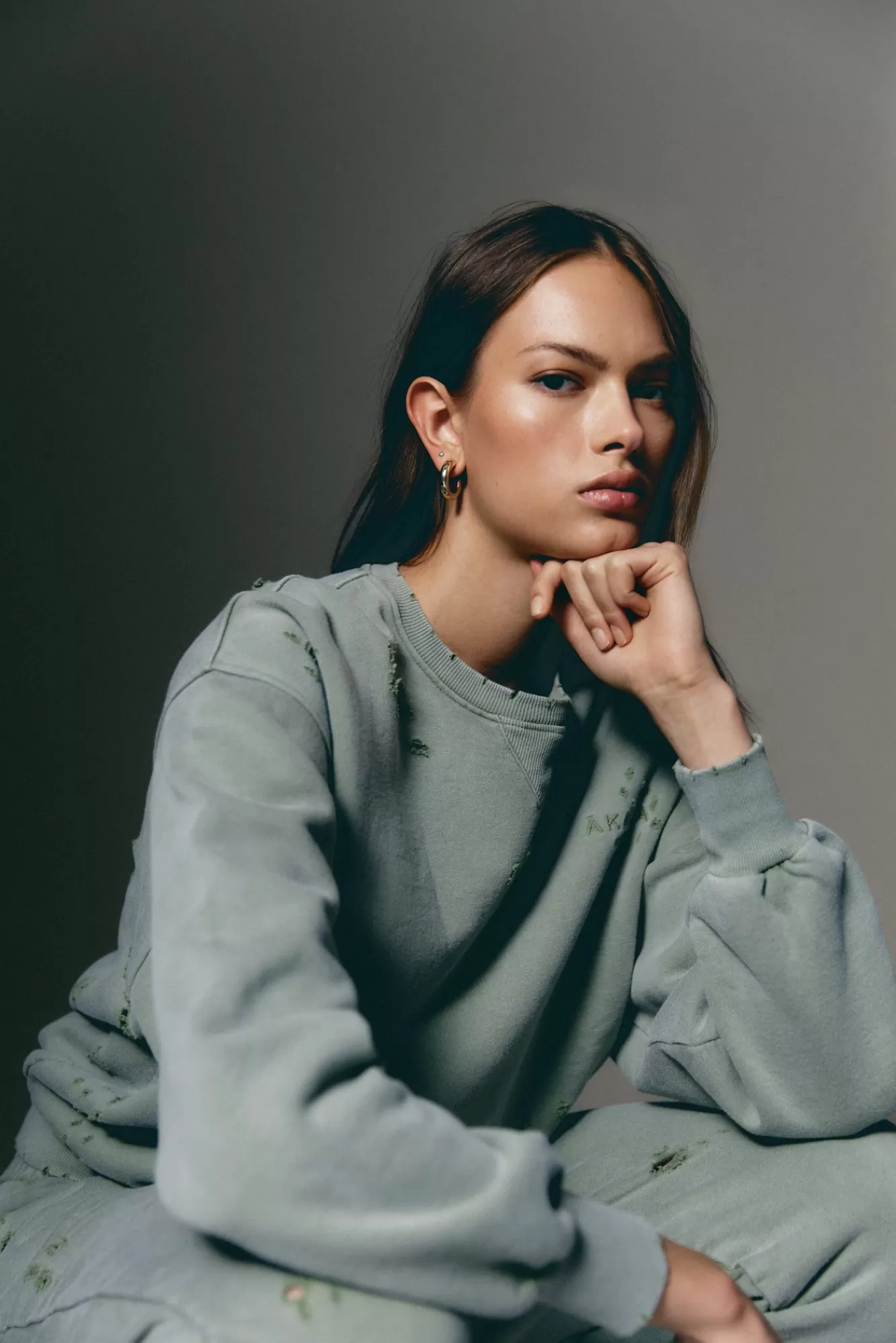 The Akala Studio Distressed Green Sweater Sale